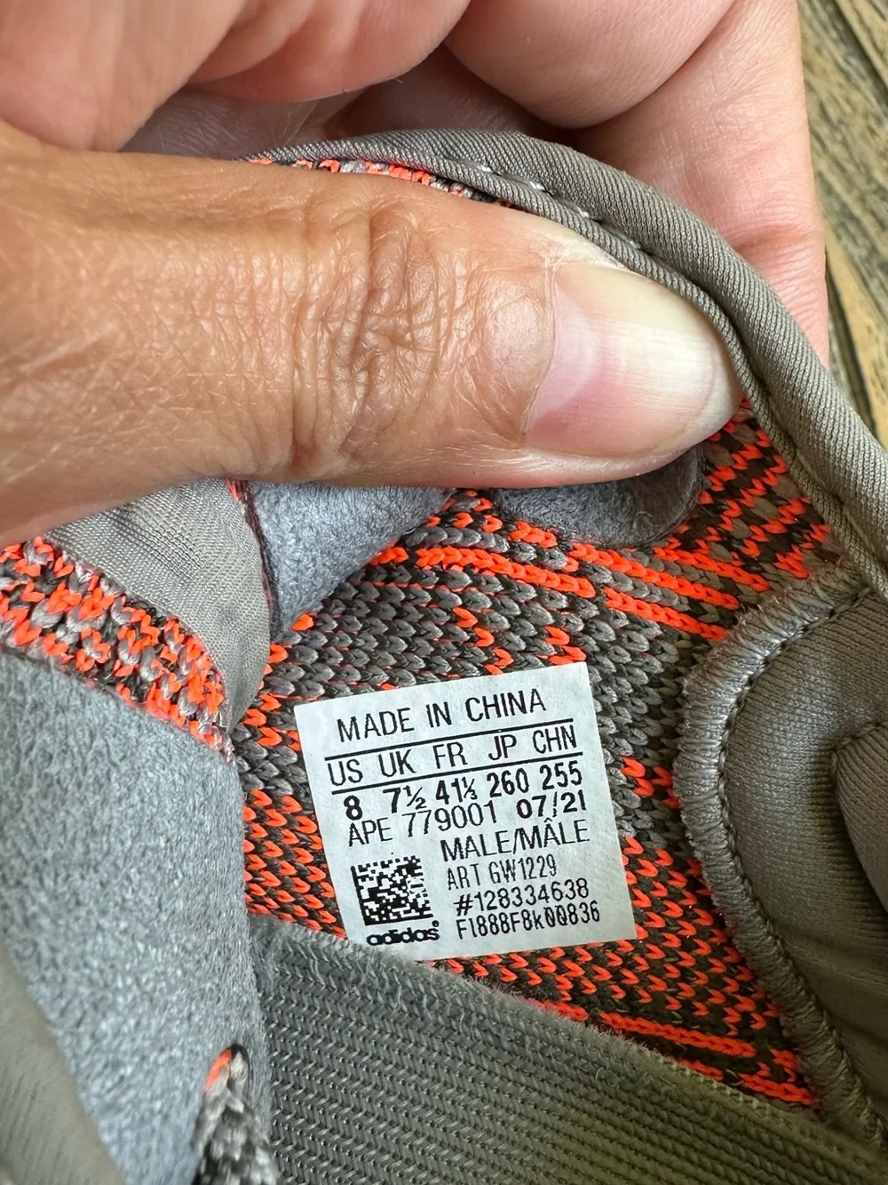 Yeezy Low-Top Sneaker in Gray with Orange Accent